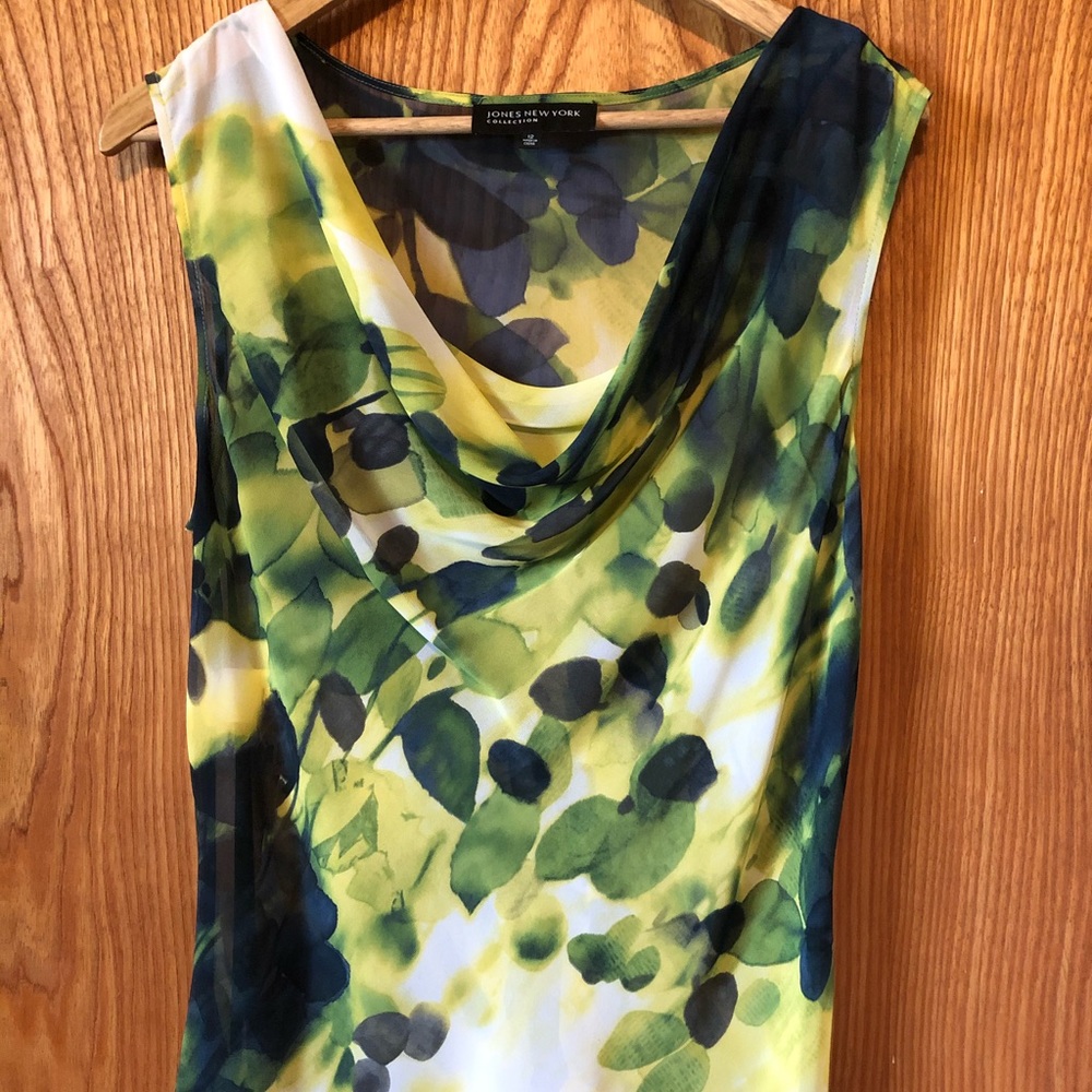 Sleeveless, semi-sheer blouse